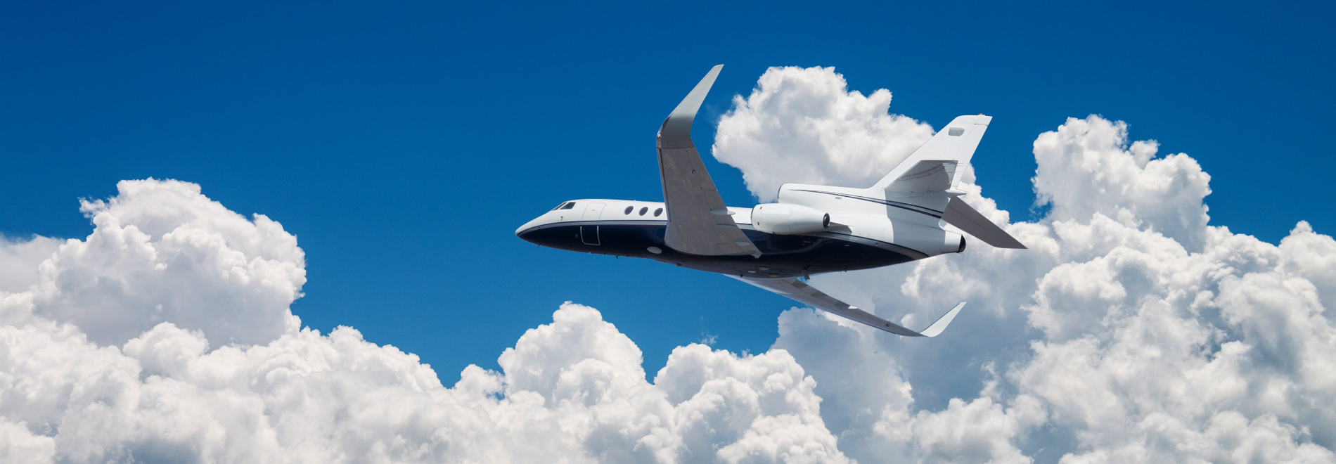 blended winglet plane flying against blue sky